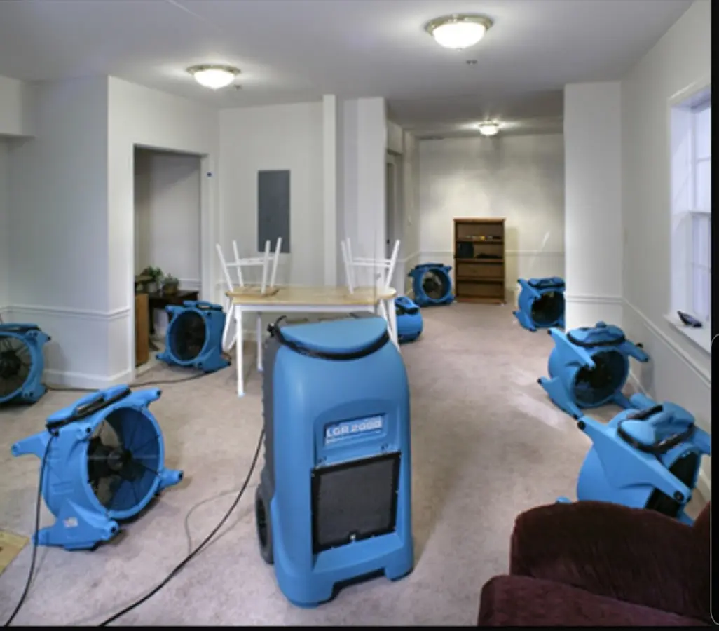 Air movers and dehumidifier setup for Water Damage Restoration in Marlboro